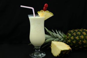 close up shot of a glass of pina colada