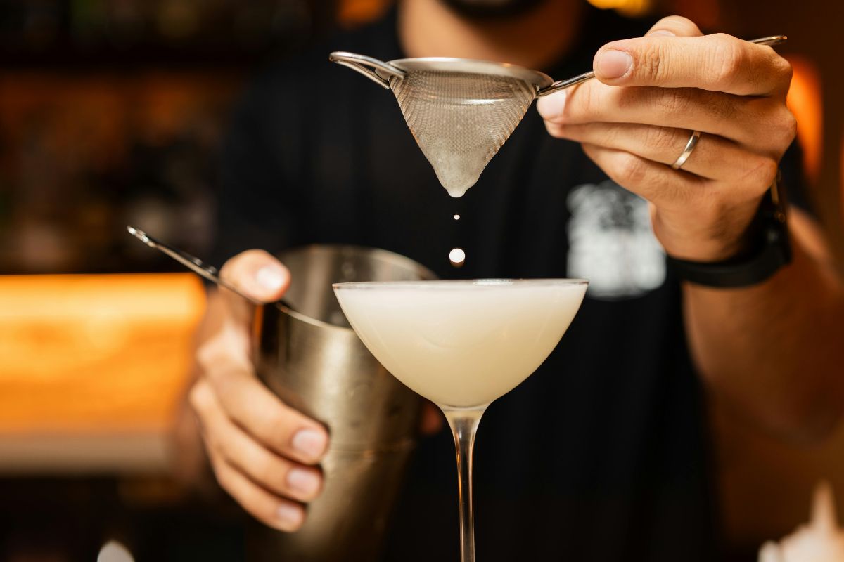 Straining a cocktail